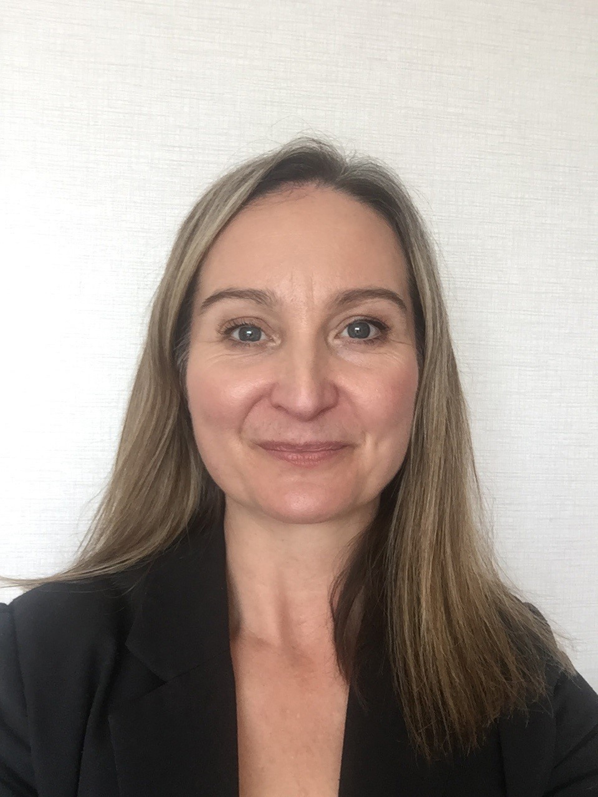 headshot of Helen Bailey. White female with long blonde hair headshot of Helen Bailey. White female with long blonde hair