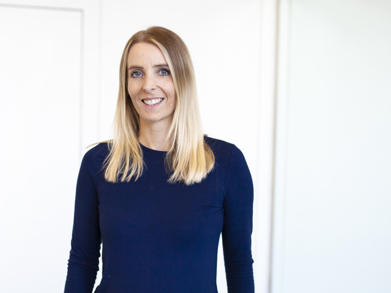 Headshot of Laura Nicholson. White female with long blonde hair wearing blue long sleeve tshirt   Headshot of Laura Nicholson. White female with long blonde hair wearing blue long sleeve tshirt