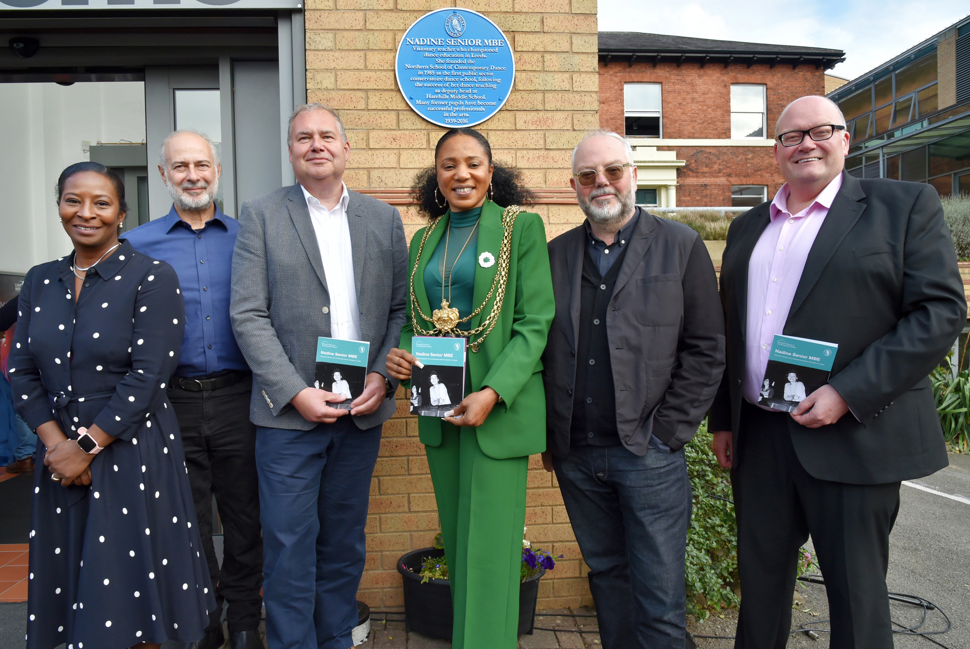 Pictured at Nadine Senior MBE blue plaque unveiling (L-R): Sharon Watson - CEO & Principal at NSCD, Nadine’s son Gareth Senior and Councillor Abigail Marshall Katung - the Lord Mayor of Leeds.  Photography courtesy of Civic Trust - by Graham Fotherby Pictured at Nadine Senior MBE blue plaque unveiling (L-R): Sharon Watson - CEO & Principal at NSCD, Nadine’s son Gareth Senior and Councillor Abigail Marshall Katung - the Lord Mayor of Leeds.  Photography courtesy of Civic Trust - by Graham Fotherby