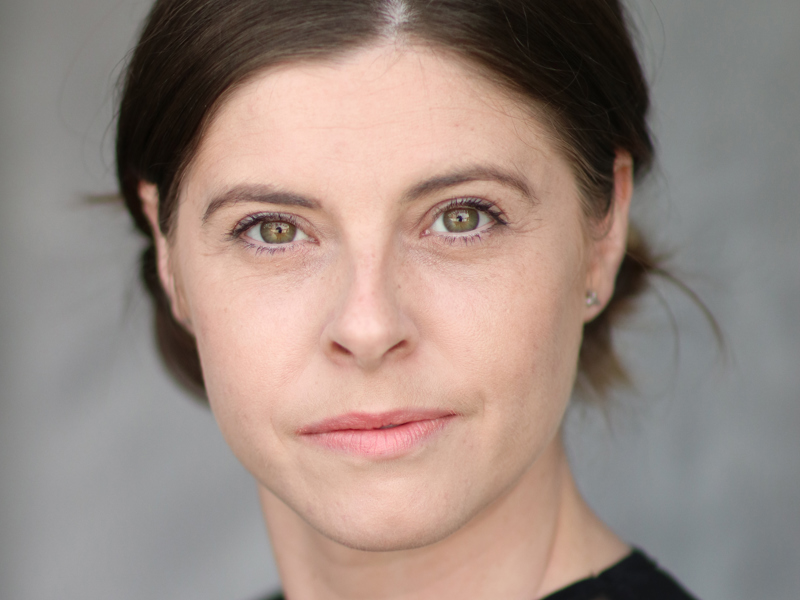 Headhot of Jessica Royle. White female with dark hair tied back Headhot of Jessica Royle. White female with dark hair tied back