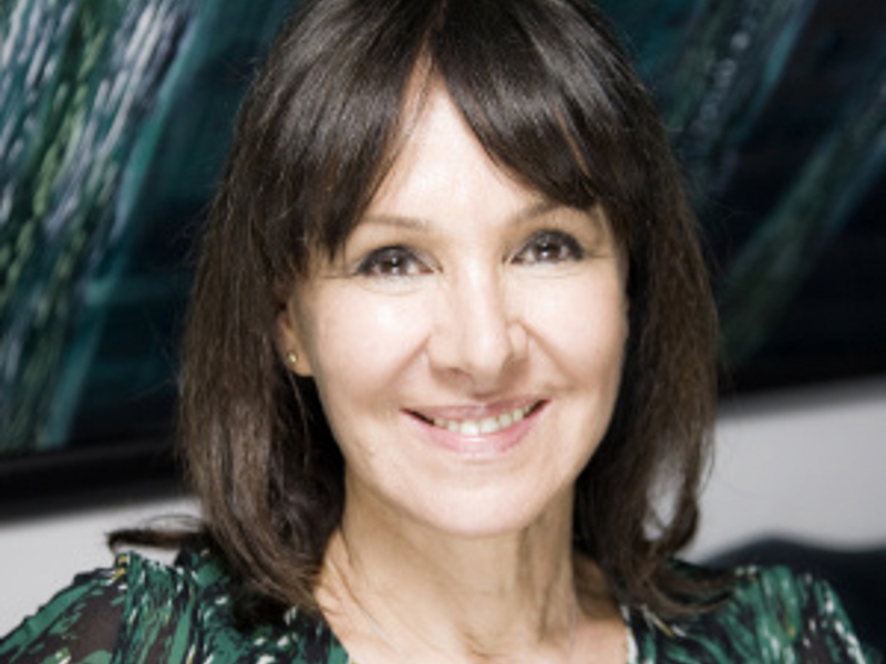 Headshot of Dame Arlene Phillips. White female with short dark hair smiling at the camera wearing green top Headshot of Dame Arlene Phillips. White female with short dark hair smiling at the camera wearing green top
