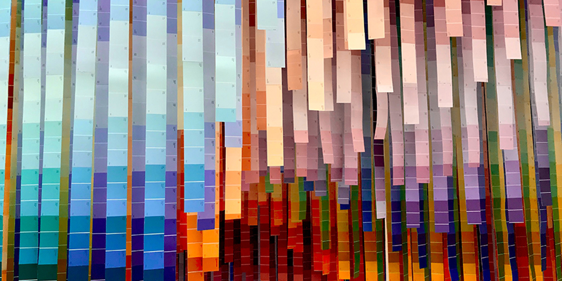 lots of blue and orange colour charts hanging lots of blue and orange colour charts hanging